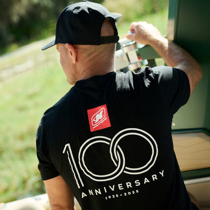 100th Anniversary Stacked Logo Tee - Black - CLEARANCE